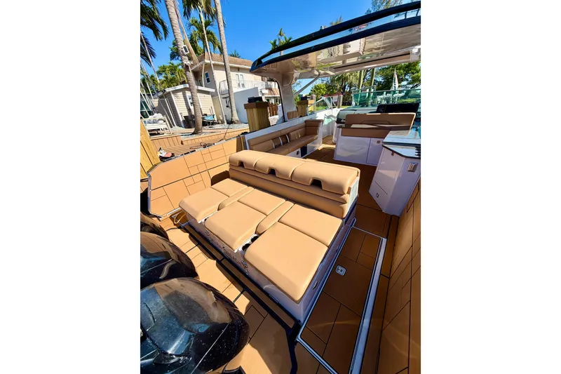 Slide: The Image of 2023 Aviara AV40 OB luxury boat interior with tan seating and modern design. - 41