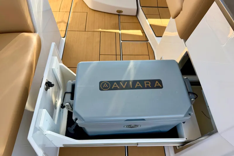 Slide: The Image of 2023 Aviara AV40 OB boat interior with built-in cooler drawer. - 6