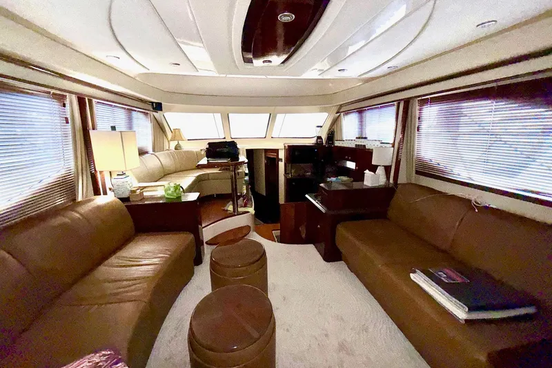 Slide: The Image of Luxurious interior of 2007 Sea Ray 52 Sedan Bridge yacht with leather seating and elegant decor. - 36