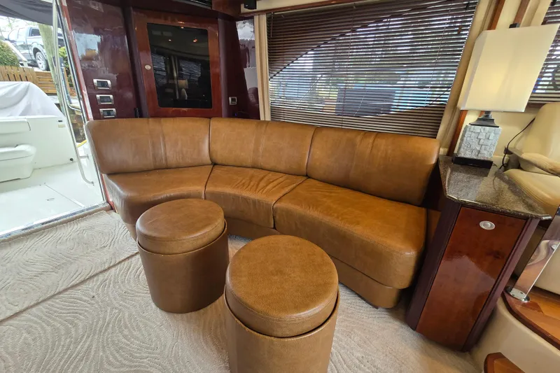 Slide: The Image of Luxurious interior of 2007 Sea Ray 52 Sedan Bridge with leather seating and elegant decor. - 41
