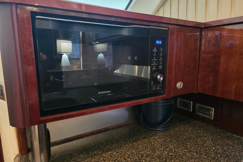 Slide: The Image of Samsung microwave in 2007 Sea Ray 52 Sedan Bridge yacht kitchen. - 49