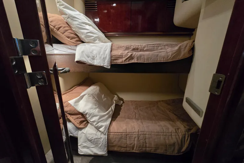 Slide: The Image of Bunk beds in 2007 Sea Ray 52 Sedan Bridge yacht cabin, cozy and well-appointed. - 59
