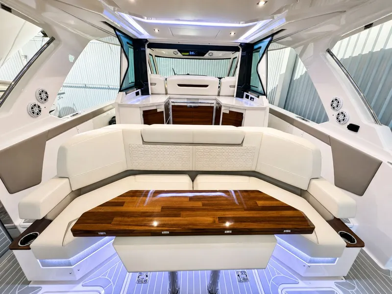 Slide: The Image of Interior of 2023 Tiara Yachts 48 LS with luxurious seating area. - 15