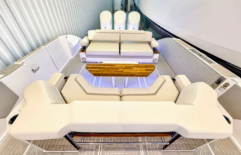 Slide: The Image of Interior view of 2023 Tiara Yachts 48 LS with luxurious seating arrangement. - 16