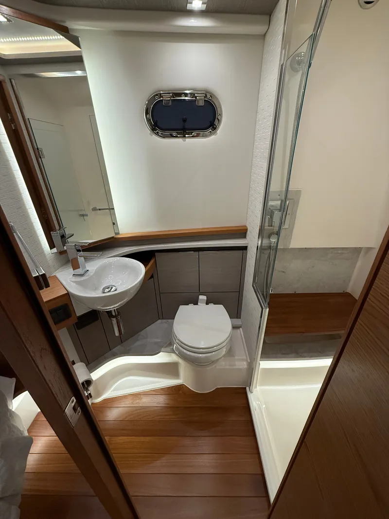 Slide: The Image of Luxurious bathroom in the 2023 Tiara Yachts 48 LS yacht. - 19