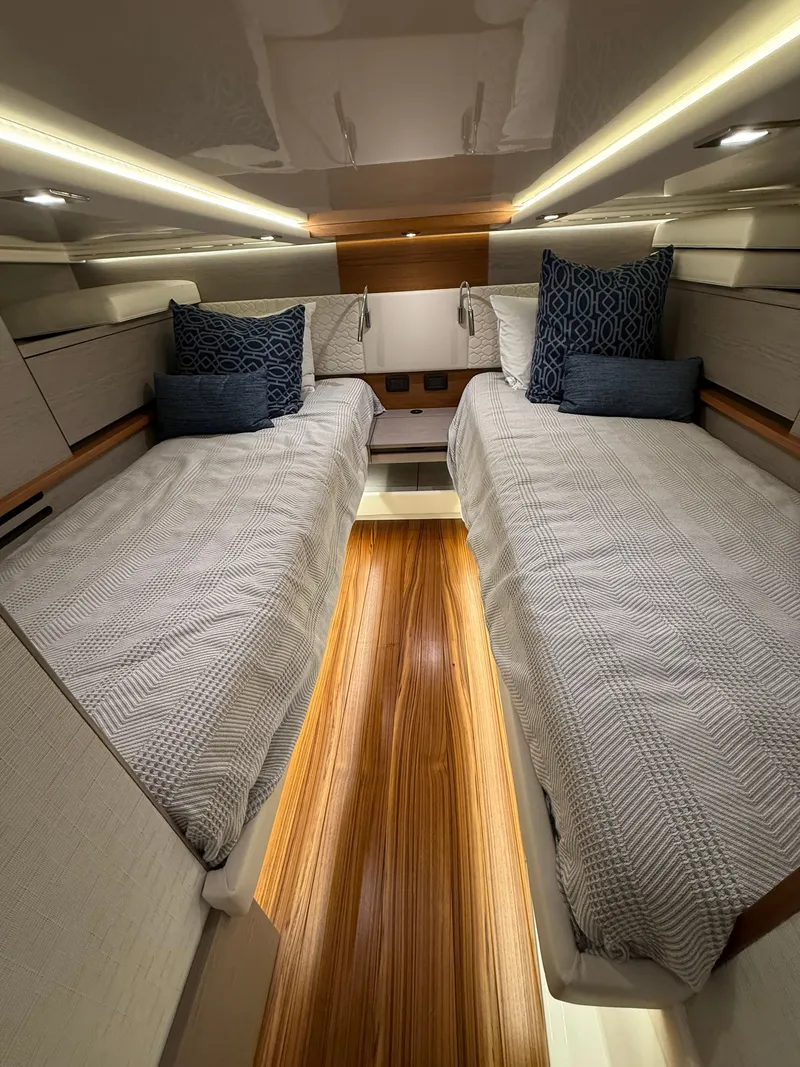 Slide: The Image of Interior of 2023 Tiara Yachts 48 LS with twin beds. - 21