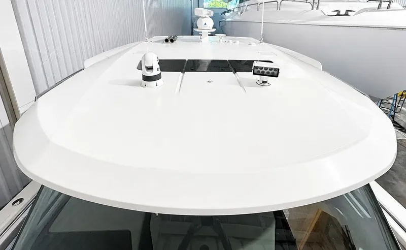 Slide: The Image of Roof of 2023 Tiara Yachts 48 LS with modern equipment. - 22