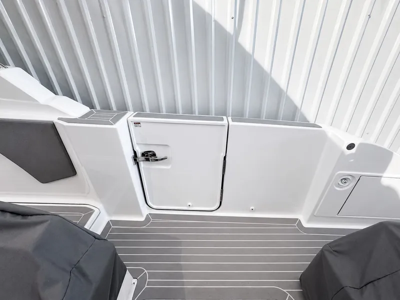 Slide: The Image of Interior of 2023 Tiara Yachts 48 LS with gray flooring. - 24