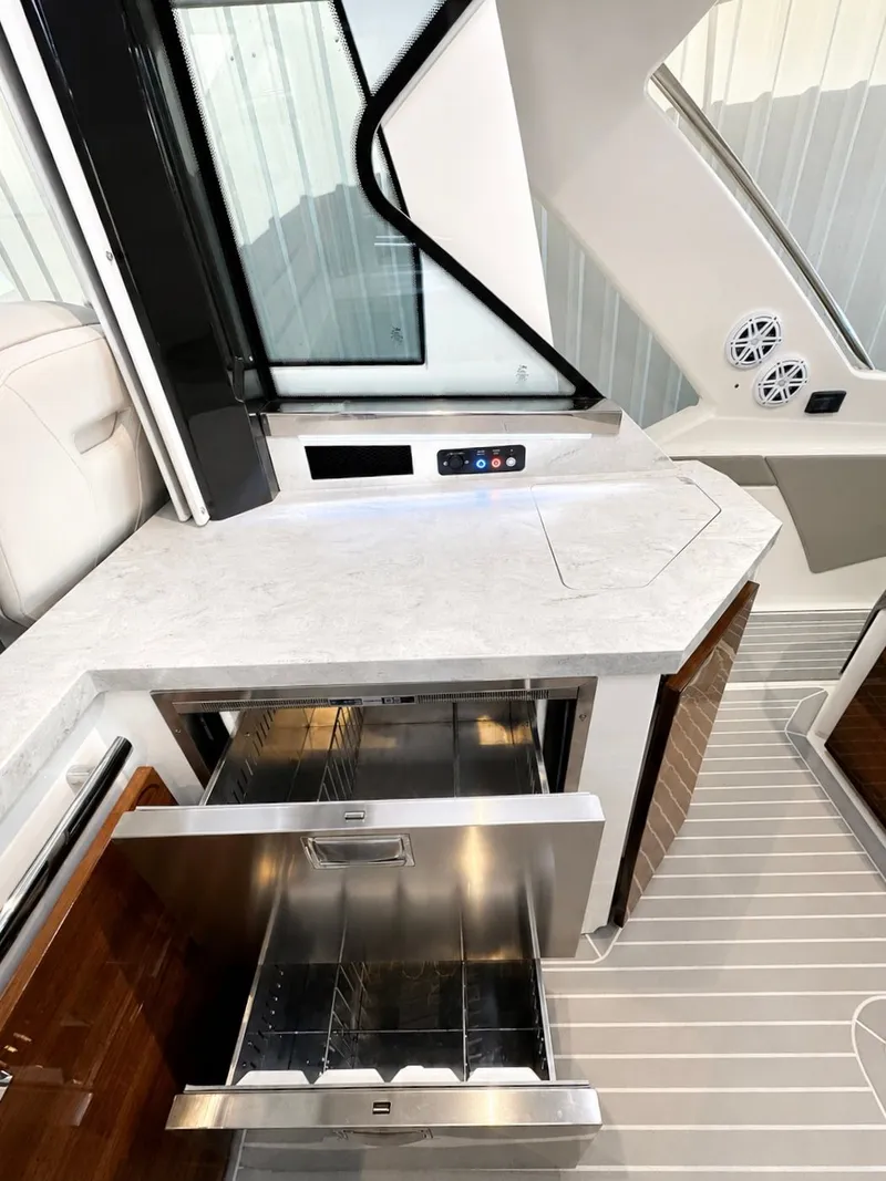 Slide: The Image of Interior of 2023 Tiara Yachts 48 LS with open drawer. - 26