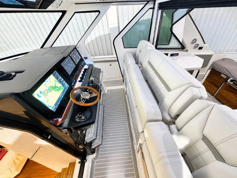 Slide: The Image of Interior of 2023 Tiara Yachts 48 LS with modern cockpit. - 4