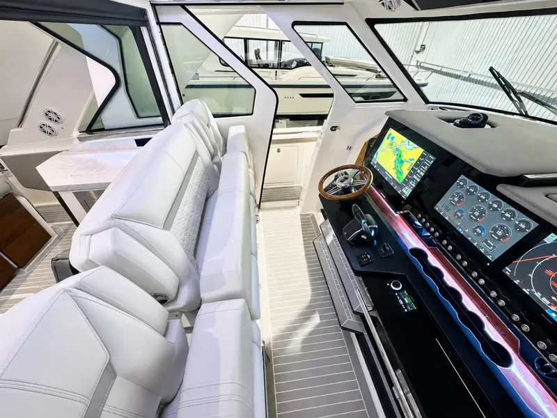Slide: The Image of Interior of 2023 Tiara Yachts 48 LS featuring modern cockpit. - 5