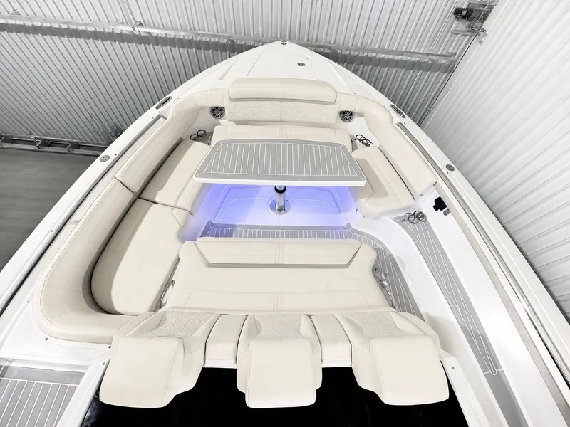 Slide: The Image of Interior view of 2023 Tiara Yachts 48 LS with luxurious seating arrangement. - 8