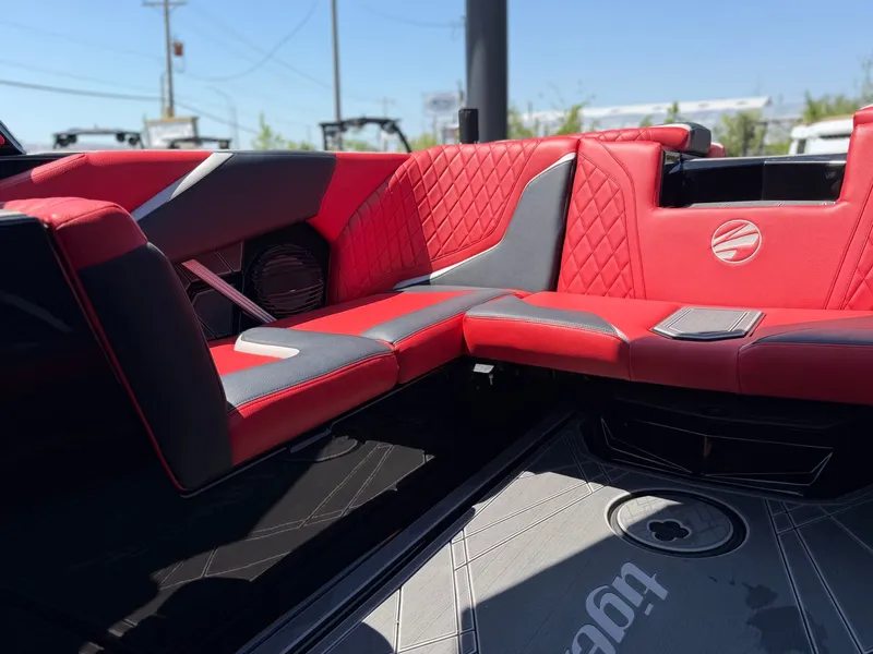 Slide: The Image of Interior of 2023 Tigé 24RZX with red leather seating. - 15
