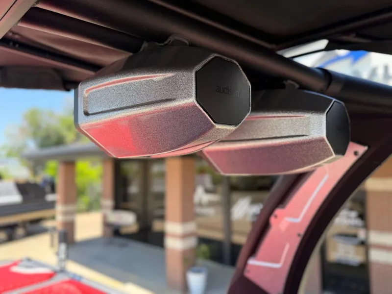 Slide: The Image of Close-up of speakers on a 2023 Tigé 24RZX boat. - 18