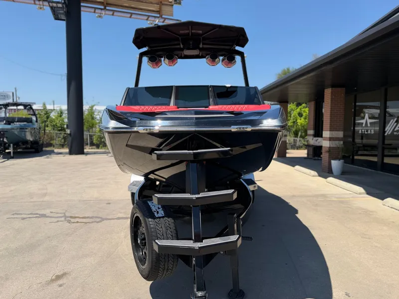 Slide: The Image of 2023 Tigé 24RZX boat on a trailer, front view. - 8