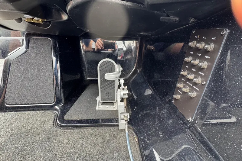 Slide: The Image of 2022 Skeeter ZX150 boat dashboard with control panel and foot pedal. - 20