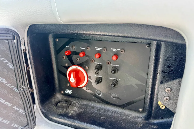 Slide: The Image of Control panel of a 2014 Nautique Super Air Nautique 210 boat. - 66