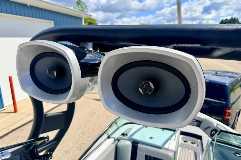 Slide: The Image of Close-up of speakers on a 2014 Nautique Super Air Nautique 210 boat. - 91
