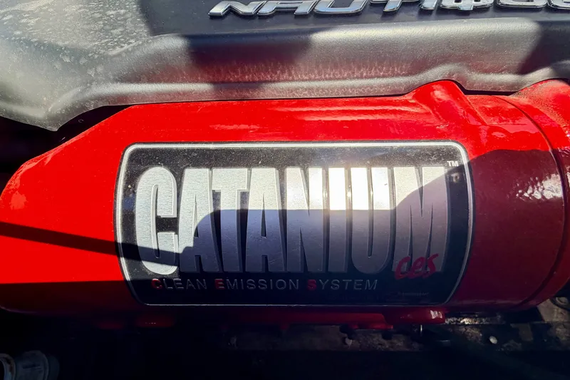 Slide: The Image of 2014 Nautique Super Air Nautique 210 engine with Catanium Clean Emission System. - 31