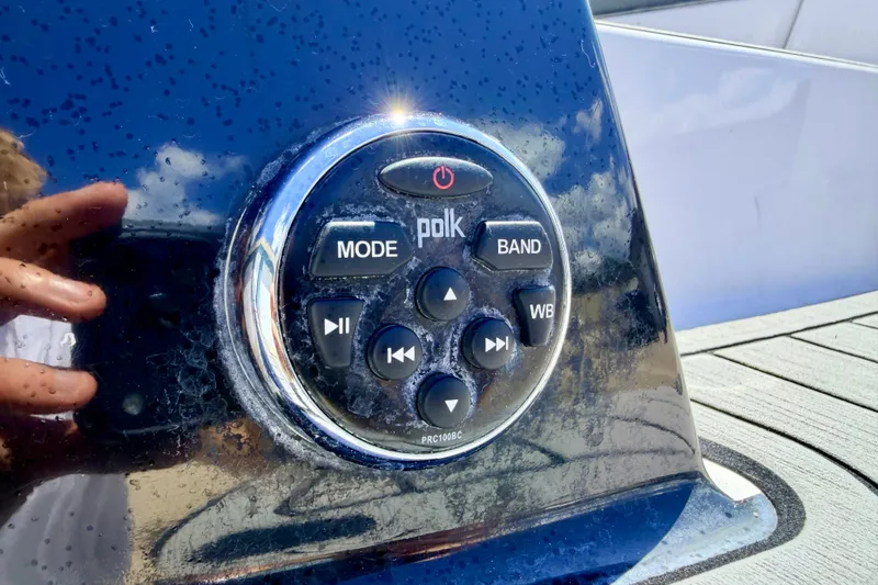 Slide: The Image of Close-up of Polk audio control panel on 2014 Nautique Super Air Nautique 210 boat. - 18
