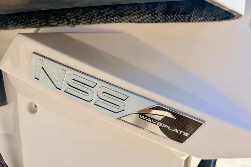 Slide: The Image of Close-up of 2014 Nautique Super Air Nautique 210 NSS Waveplate emblem. - 20