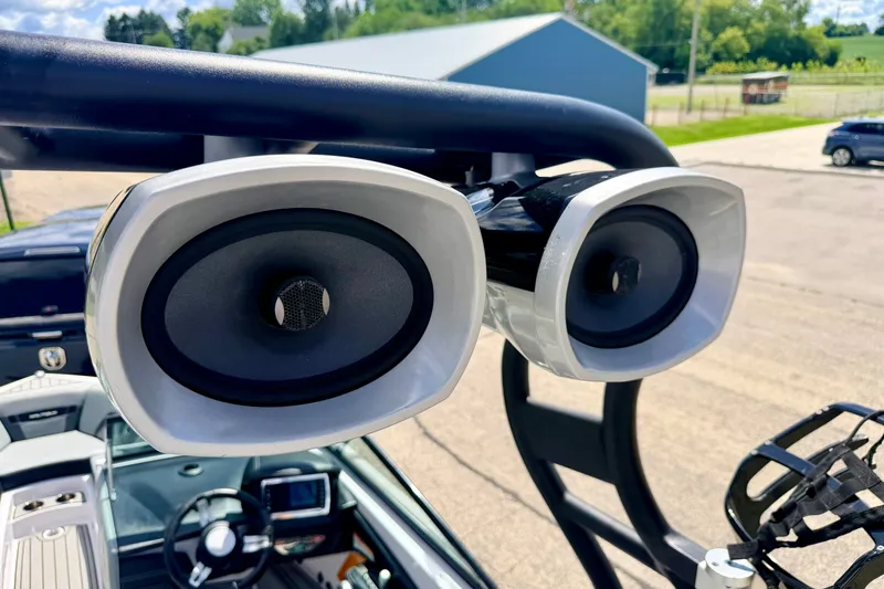 Slide: The Image of 2014 Nautique Super Air Nautique 210 boat speakers, close-up view. - 92