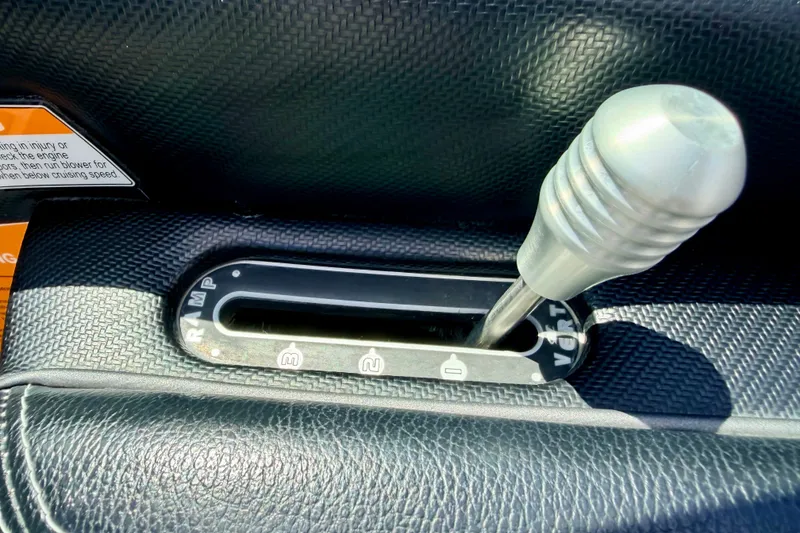 Slide: The Image of Gear lever of 2014 Nautique Super Air Nautique 210 boat, close-up view. - 57