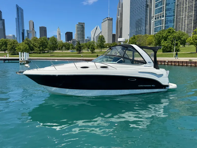 The Image of 2011 Chaparral 290 Signature boat in front of city skyline. - 0