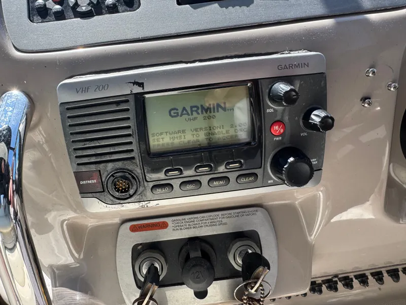 Slide: The Image of Garmin VHF 200 radio on 2011 Chaparral 290 Signature. - 12