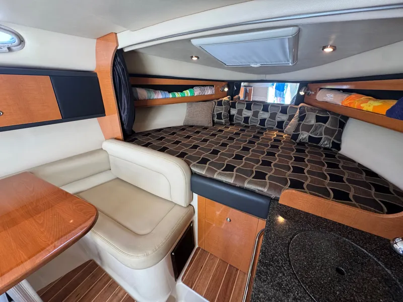 Slide: The Image of Interior of 2011 Chaparral 290 Signature with cozy sleeping area. - 15