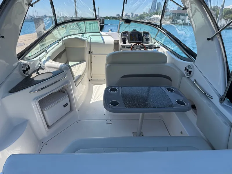 Slide: The Image of Interior of 2011 Chaparral 290 Signature with table and seating area. - 3