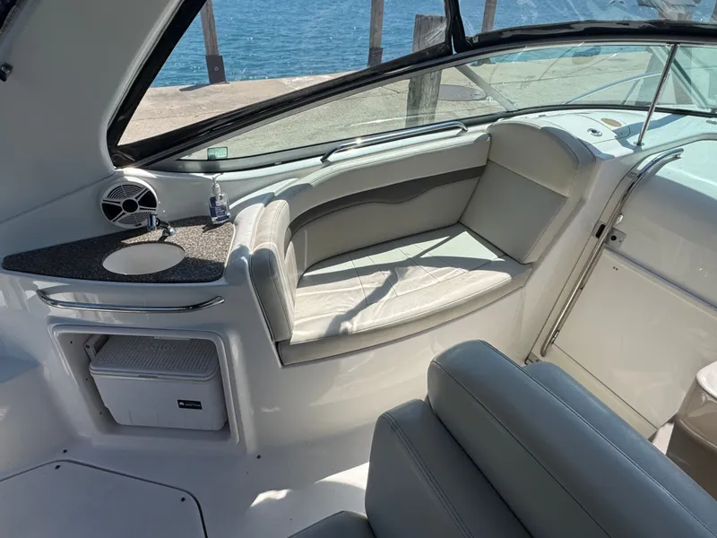 Slide: The Image of Interior of a 2011 Chaparral 290 Signature yacht with seating area. - 5