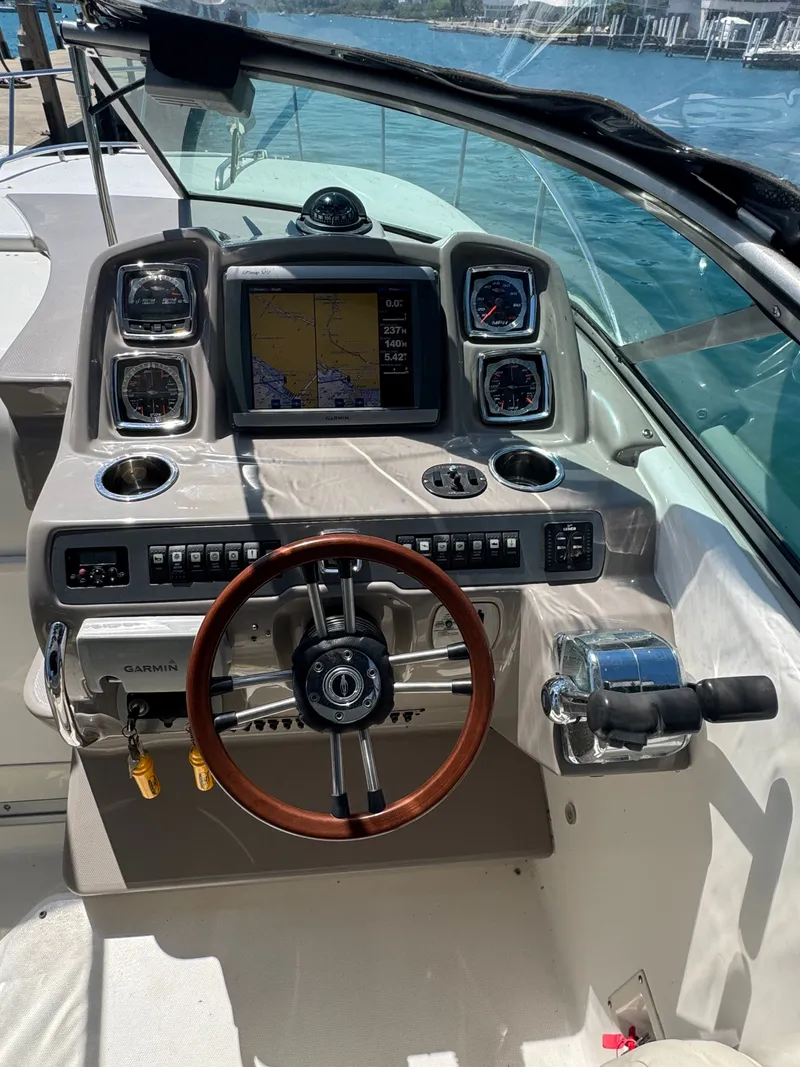 Slide: The Image of 2011 Chaparral 290 Signature boat helm with navigation system. - 8