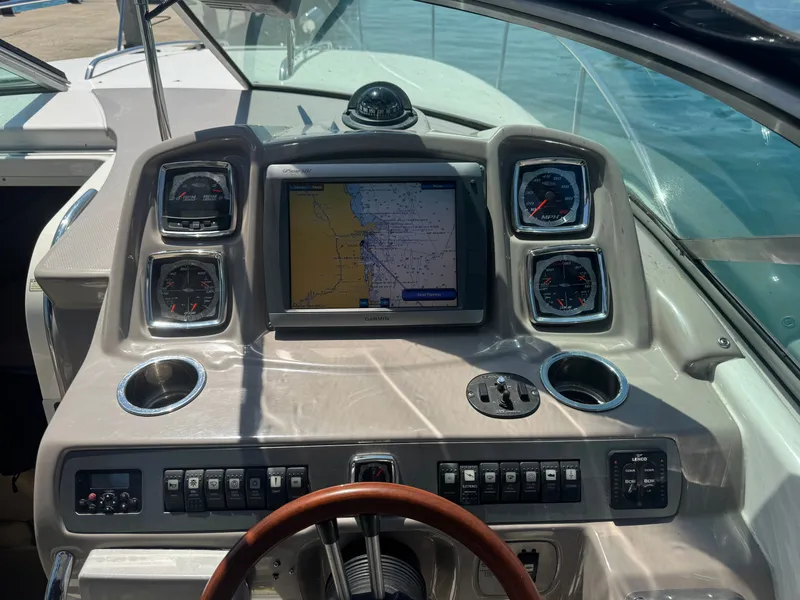 Slide: The Image of Dashboard of a 2011 Chaparral 290 Signature boat with navigation system. - 9