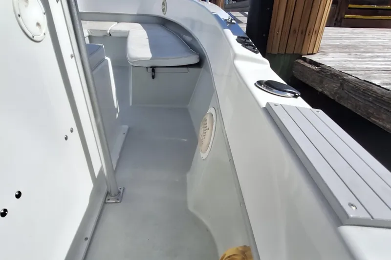 Slide: The Image of Interior view of a 2001 Dusky 252 Open Fisherman boat. - 15