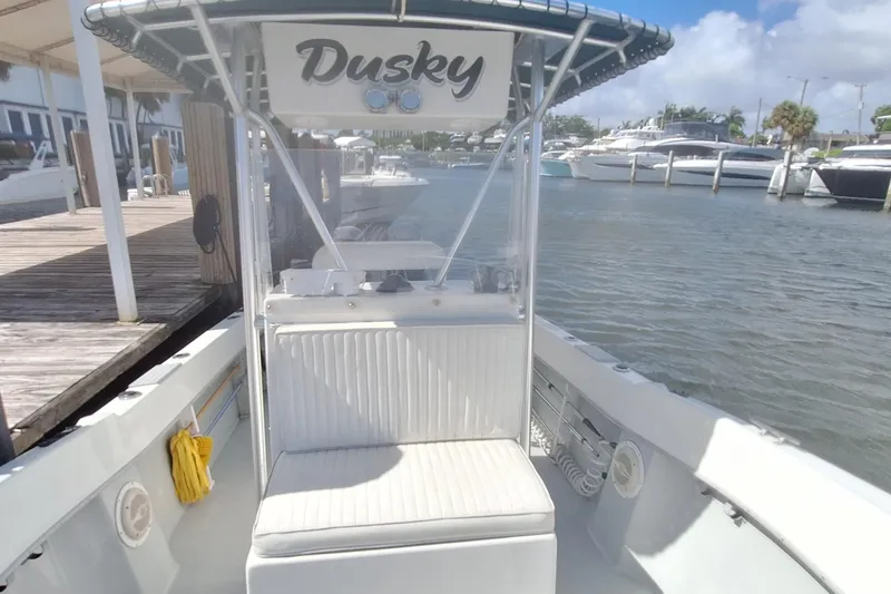 Slide: The Image of Dusky 252 Open Fisherman 2001 at dock, sunny day. - 6