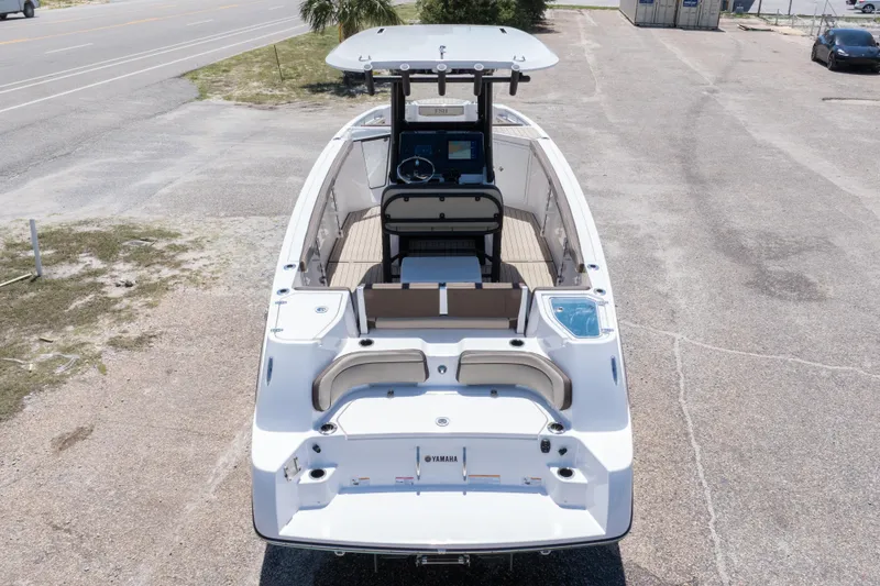 Slide: The Image of 2025 Yamaha Boats 255 FSH Sport E, aerial view, showcasing spacious deck and modern design. - 5