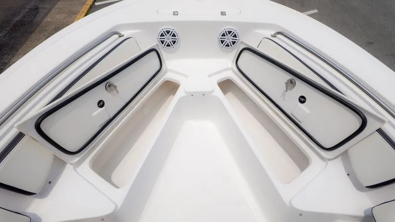 Slide: The Image of Tidewater 198 CC Adventure 2025, open storage compartments in bow area. - 11