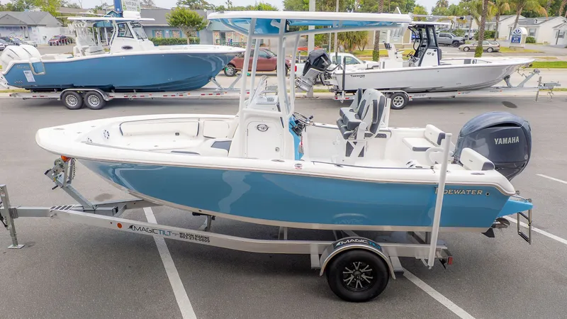 Slide: The Image of 2025 Tidewater 198 CC Adventure boat on trailer. - 3