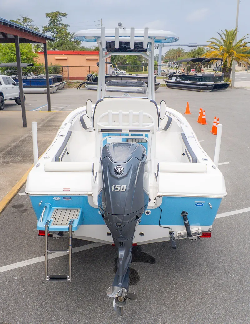 Slide: The Image of Rear view of 2025 Tidewater 198 CC Adventure boat at dock. - 4