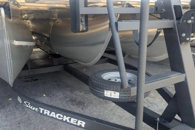 Slide: The Image of 2026 Sun Tracker Party Barge 22 RF XP3 pontoon boat on trailer. - 4