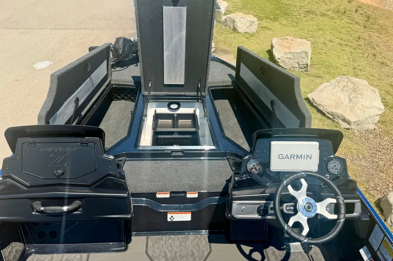 Slide: The Image of 2026 Nitro Z20 XL Pro boat interior with Garmin navigation system and storage compartments. - 12