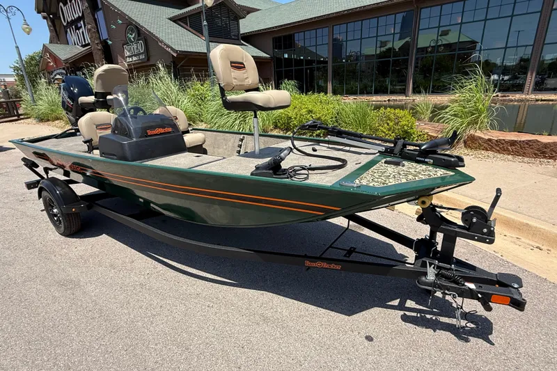 Slide: The Image of 2026 Tracker Bass Tracker Classic Limited fishing boat on trailer, parked outdoors. - 7