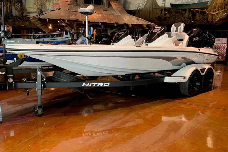The Image of 2026 Nitro Z19 XL boat on display in showroom with trailer. - 0