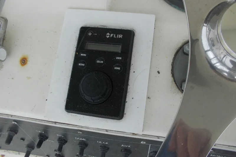 Slide: The Image of FLIR control panel on 1982 Hatteras 46 Convertible yacht dashboard. - 20