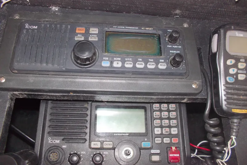 Slide: The Image of ICOM marine radios and transceiver equipment on a 1982 Hatteras 46 Convertible boat. - 26