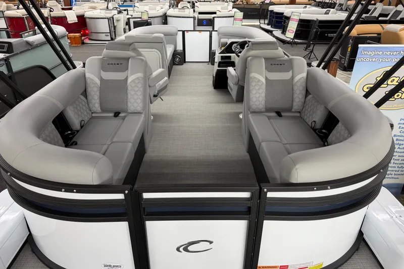 Slide: The Image of 2026 Crest Conquest 210 SLC pontoon boat with spacious seating and modern design. - 10