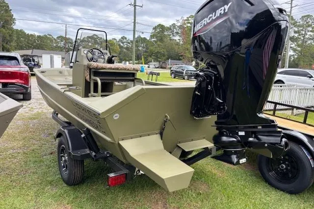 Slide: The Image of 2026 Lowe Roughneck 1760 Deluxe Tiller boat with Mercury outboard motor on trailer. - 4