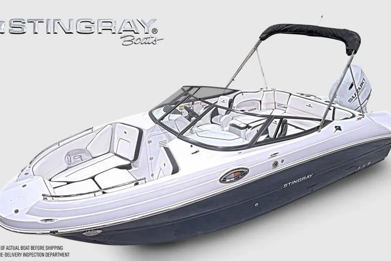 Slide: The Image of 2026 Stingray 211 DC boat with sleek design and spacious seating. - 2