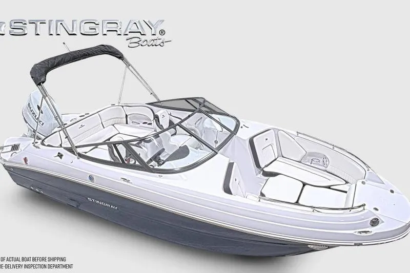 Slide: The Image of 2026 Stingray 211 DC boat with sleek design and spacious seating. - 5